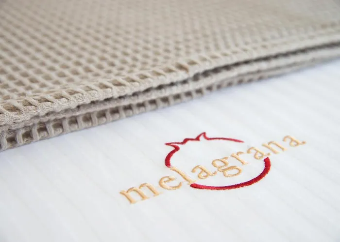 Melagrana アパートホテル アダマス